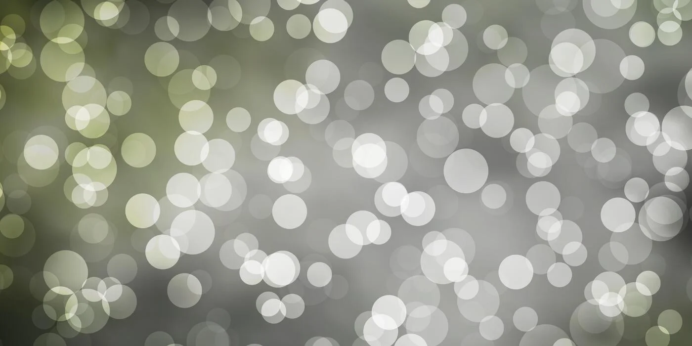 Tranh vẽ 20 11 với nền bokeh trừu tượng gồm những đốm sáng trắng và xanh xám mờ ảo