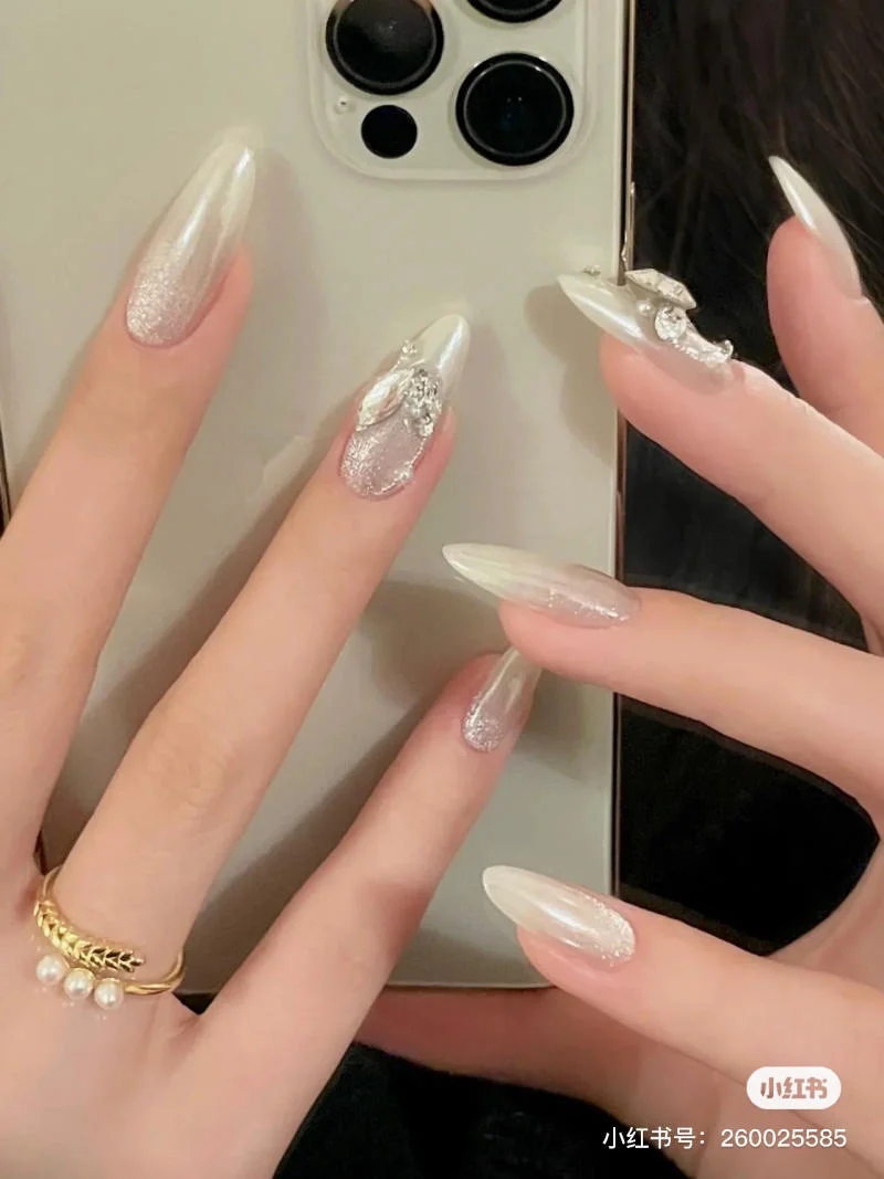 Mẫu nail mắt mèo trắng